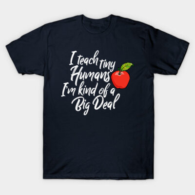 Navy blue teacher-themed t-shirt with apple graphic and motivational quote, casual cotton apparel for educators.