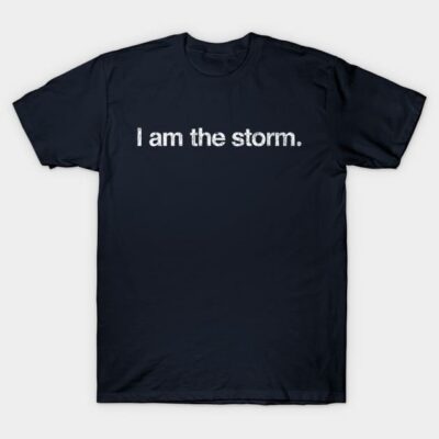 Navy blue t-shirt with "I am the storm" text, casual style, cotton material, unisex design, motivational wear.