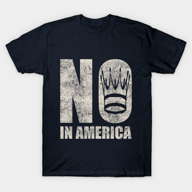 Navy blue graphic t-shirt with "NO IN AMERICA" text and crown design, casual style, soft cotton material.