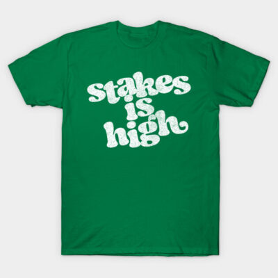 Green unisex t-shirt with "Stakes Is High" text in white, casual style, perfect for everyday wear.