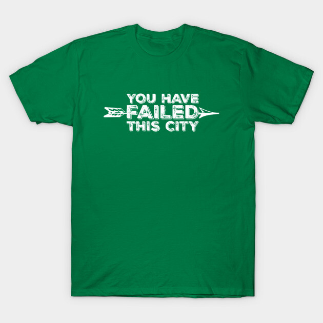 Green cotton t-shirt with "You Have Failed This City" printed in white, casual style for everyday wear.