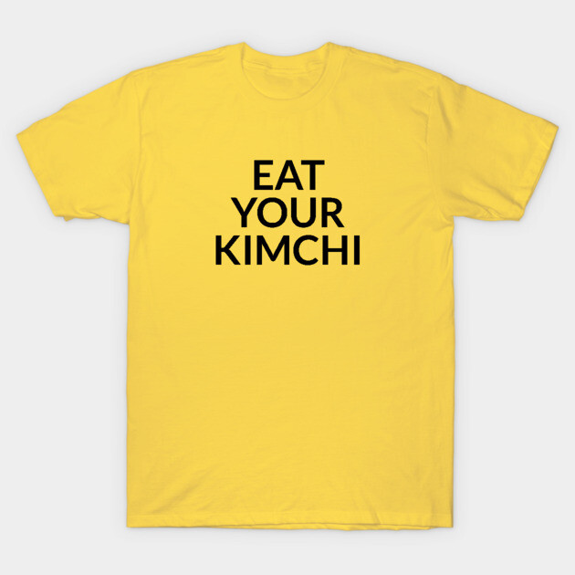 Yellow cotton t-shirt with "Eat Your Kimchi" text, casual style, perfect for everyday wear and comfort.