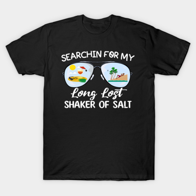 Black t-shirt with "Searchin for my long lost shaker of salt" text, featuring tropical sunglasses graphic design.