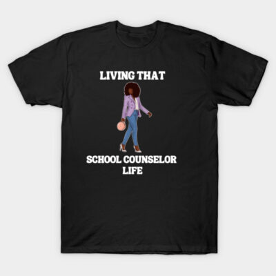 Black t-shirt with "Living That School Counselor Life" text and stylish graphic, casual wear, cotton material.