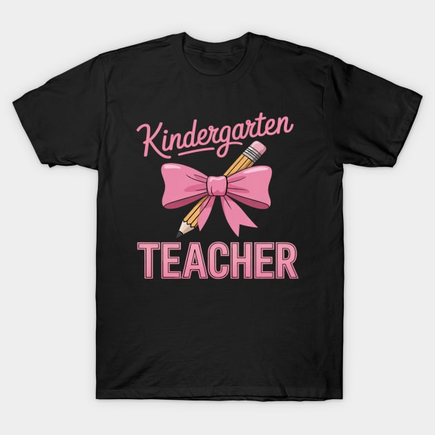Black T-shirt with pink "Kindergarten Teacher" text and bow design, ideal for educators. Casual, comfortable cotton.