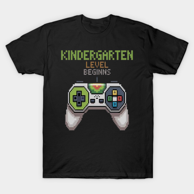 Black gamer-themed t-shirt with "Kindergarten Level Begins" text and pixel art game controller design.