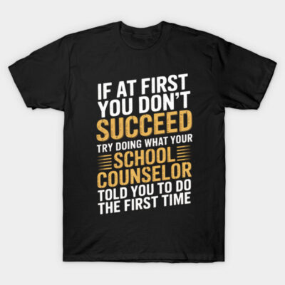 Black t-shirt with motivational quote design in bold yellow and white text, casual wear, cotton material.