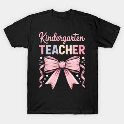 Black "Kindergarten Teacher" T-shirt with pink bow graphic, cotton, unisex, casual style, perfect for educators.