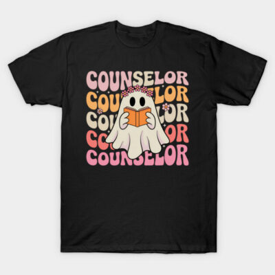 Black T-shirt with colorful "Counselor" text and cartoon ghost holding book, perfect for casual wear or gifts.