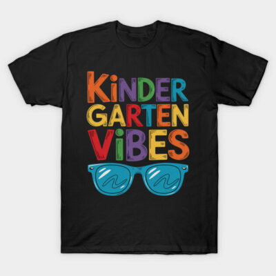 Black t-shirt with colorful "Kindergarten Vibes" text and blue sunglasses graphic, casual cotton design.