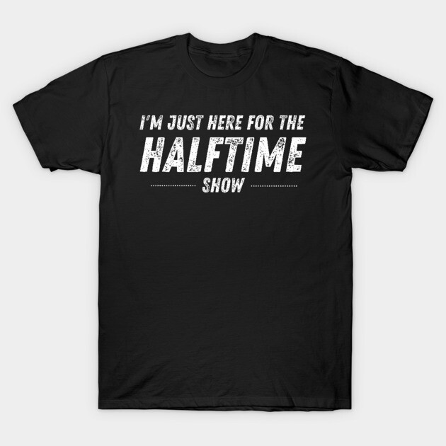 Black cotton T-shirt with "I'm Just Here for the Halftime Show" text, casual style, perfect for sports events.