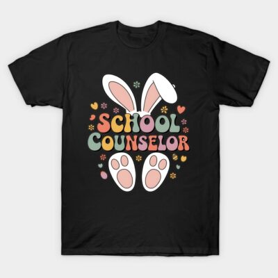 Black t-shirt with colorful "School Counselor" text, bunny ears, and paw design. Ideal for casual wear or gifts.