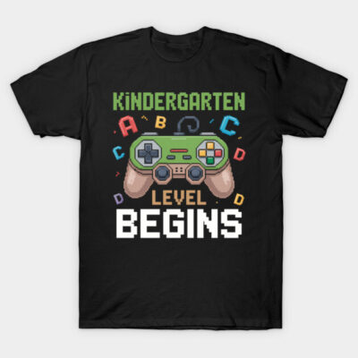 Black T-shirt with colorful gaming controller design, "Kindergarten Level Begins," perfect for kids.