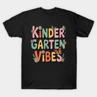 Black t-shirt with colorful "Kindergarten Vibes" text and floral butterfly design, casual style, cotton material.