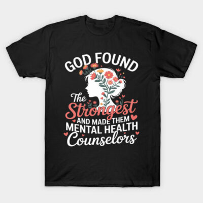 Black T-shirt with floral silhouette design and inspirational text about mental health counselors, casual wear.
