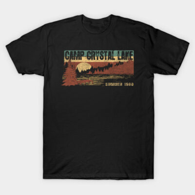 Black graphic t-shirt with "Camp Crystal Lake" vintage design, featuring forest and sunset scene, casual cotton wear.