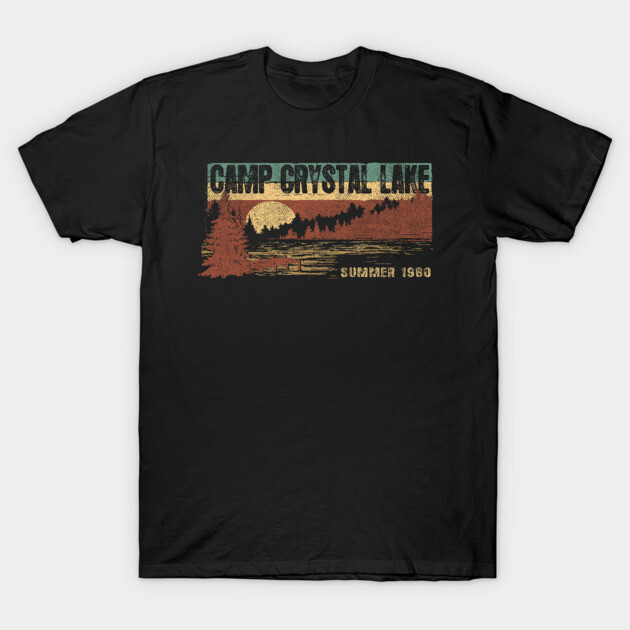 Black graphic t-shirt with "Camp Crystal Lake" vintage design, featuring forest and sunset scene, casual cotton wear.
