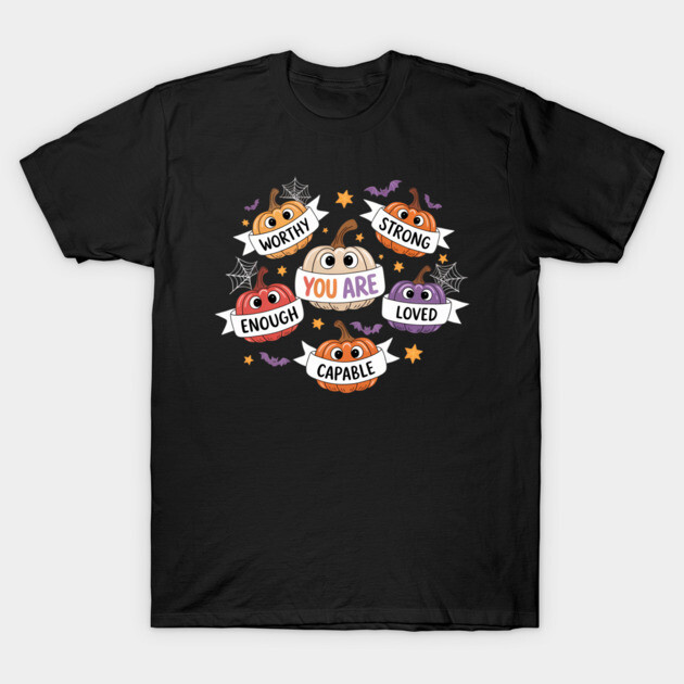 Black t-shirt with colorful pumpkin design featuring motivational words. Perfect for casual wear or Halloween events.