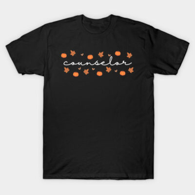 Black t-shirt with "counselor" text, fall-themed pumpkin and leaf design, casual cotton apparel for autumn wear.