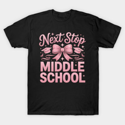 Black t-shirt with pink "Next Stop Middle School" design, featuring a bow and graduation caps, perfect for students.