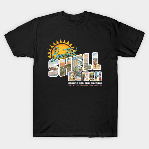 Black graphic t-shirt with "Beautiful Shell Beach" text and sun design, casual wear, cotton material.