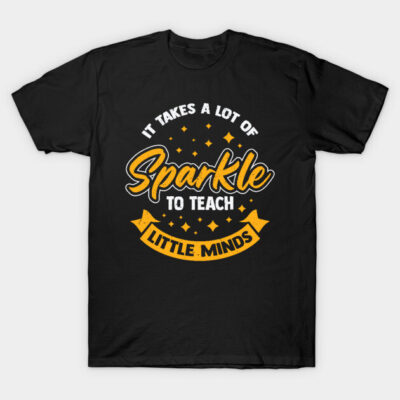 Black T-shirt with motivational "Sparkle to Teach Little Minds" graphic in yellow and white, casual style.