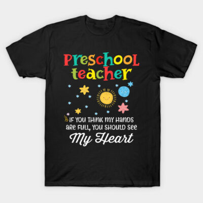Black t-shirt with colorful "Preschool Teacher" text and playful sun, moon, and stars design, ideal for educators.