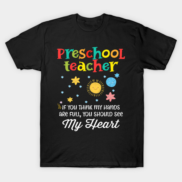 Black t-shirt with colorful "Preschool Teacher" text and playful sun, moon, and stars design, ideal for educators.
