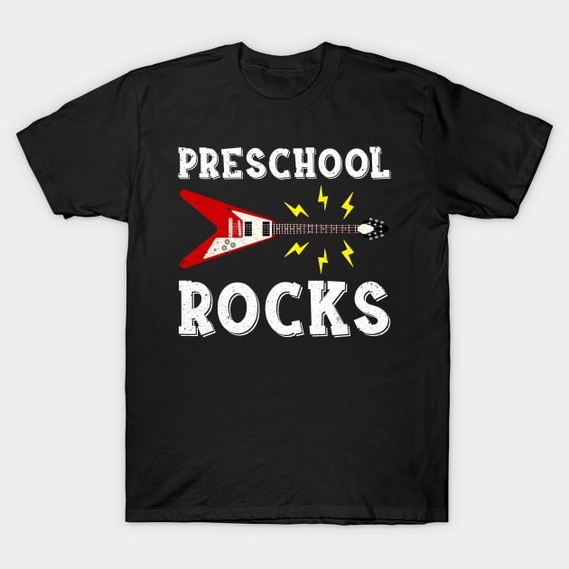 Black t-shirt with "Preschool Rocks" text and red electric guitar graphic, perfect for kids' casual wear.