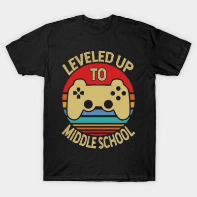 Black "Leveled Up to Middle School" t-shirt with retro game controller design, perfect for gaming enthusiasts.