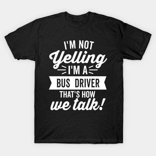 Black t-shirt with "I'm Not Yelling I'm a Bus Driver That's How We Talk" slogan, casual wear, cotton material.
