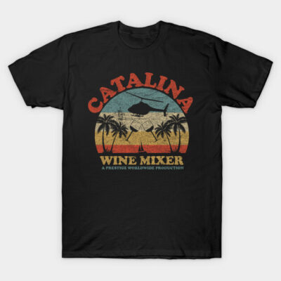 Black graphic t-shirt with "Catalina Wine Mixer" design, featuring helicopter, palm trees, and vintage sunset style.