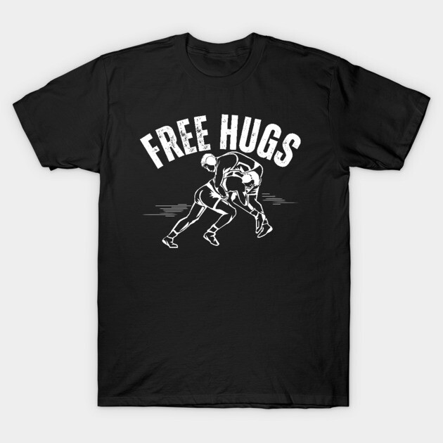 Black t-shirt with "Free Hugs" text and wrestling graphic, casual wear, soft cotton material.