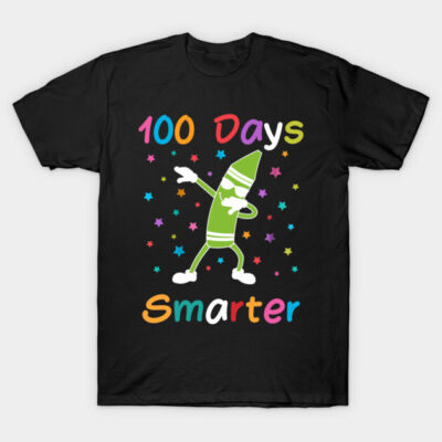 "Black T-shirt with colorful '100 Days Smarter' design featuring a dancing green crayon and stars, perfect for celebrations."