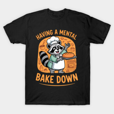 Black t-shirt with playful raccoon chef graphic, "Having a Mental Bake Down" text, perfect for casual wear.
