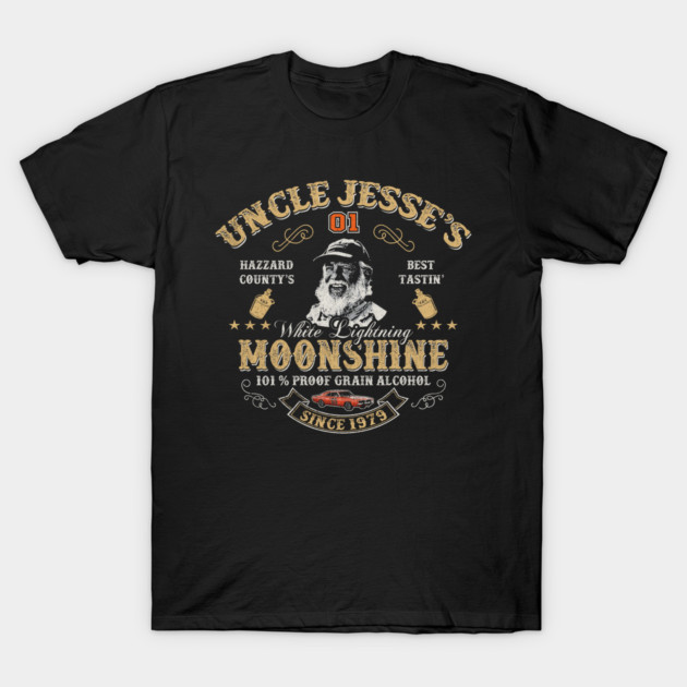 Black graphic t-shirt featuring vintage moonshine design with text and illustration, ideal for casual wear.