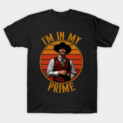 Black cotton t-shirt with retro graphic design, featuring "I'm in My Prime" text and colorful sunset background.