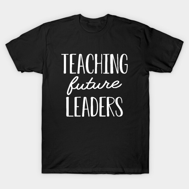 Black cotton t-shirt with "Teaching Future Leaders" text, ideal for educators, casual style, comfortable fit.