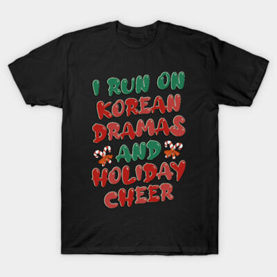 Black T-shirt with festive "I Run on Korean Dramas and Holiday Cheer" graphic in red and green. Holiday-themed casual wear.