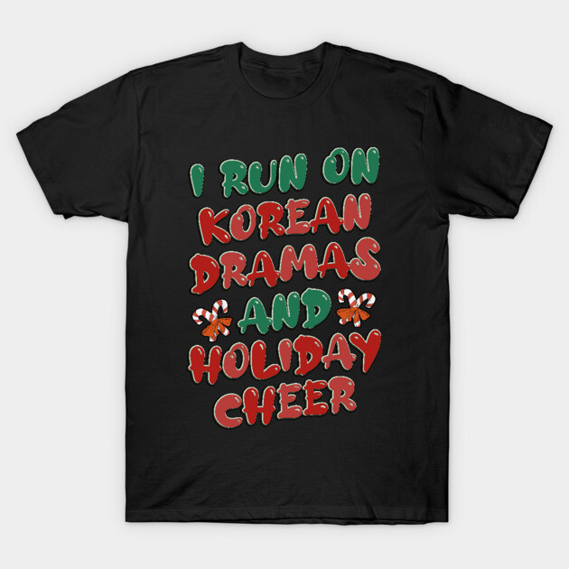 Black T-shirt with festive "I Run on Korean Dramas and Holiday Cheer" graphic in red and green. Holiday-themed casual wear.