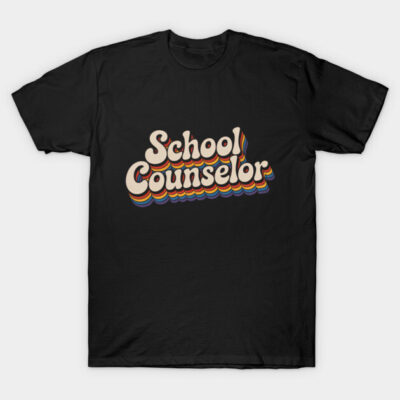 Black "School Counselor" T-shirt with retro rainbow text design, casual cotton style, ideal for educational professionals.