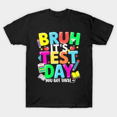 Black T-shirt with colorful "Bruh It's Test Day" graphic, featuring school-themed icons. Casual, motivational apparel.