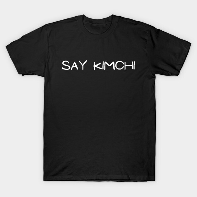 Black t-shirt with "Say Kimchi" text, casual style, made of cotton, perfect for everyday wear or gifting.