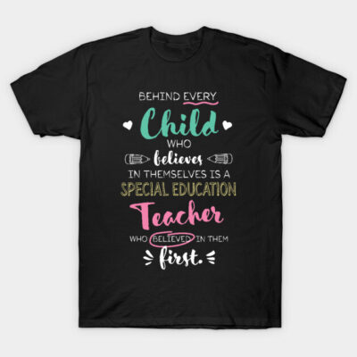 Black T-shirt with colorful motivational text for teachers, featuring educational theme and casual style.