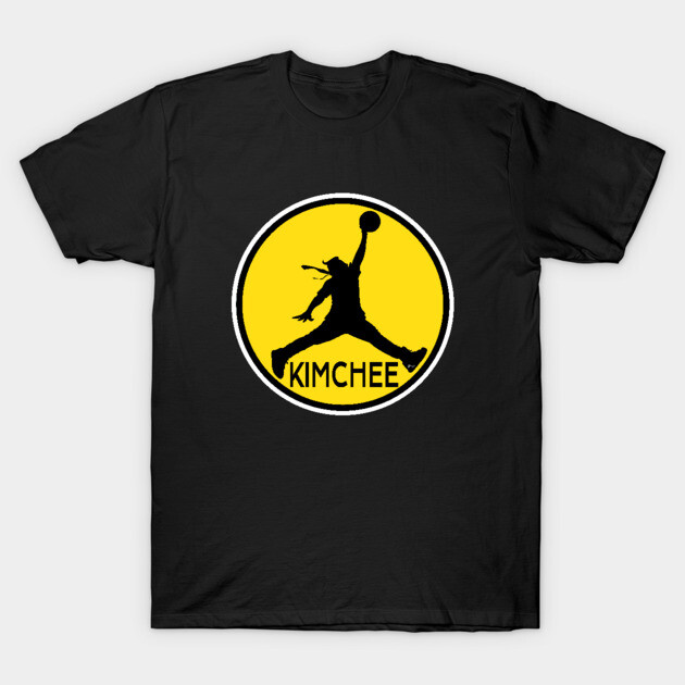 Black t-shirt with yellow circular logo featuring silhouette and "Kimchee" text, casual wear, cotton fabric.