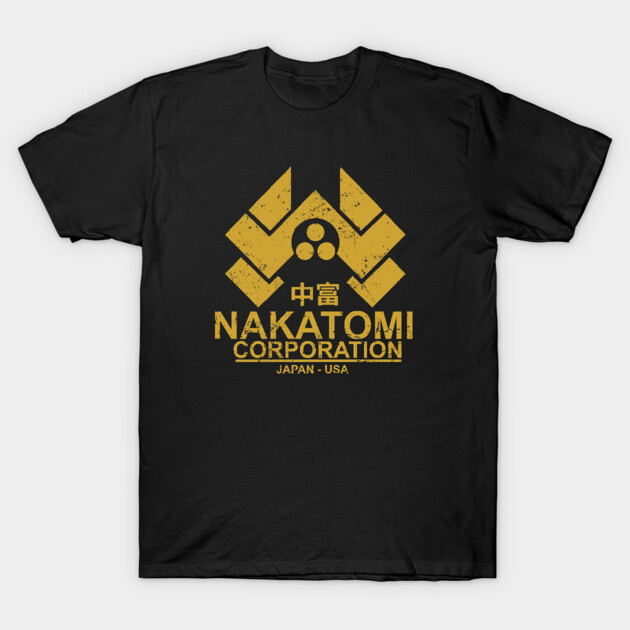 Black t-shirt with vintage gold "Nakatomi Corporation" logo, casual fit, ideal for fans of retro style.