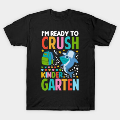 Black kids' T-shirt with colorful "I'm Ready to Crush Kindergarten" graphic, featuring a shark and backpack design.