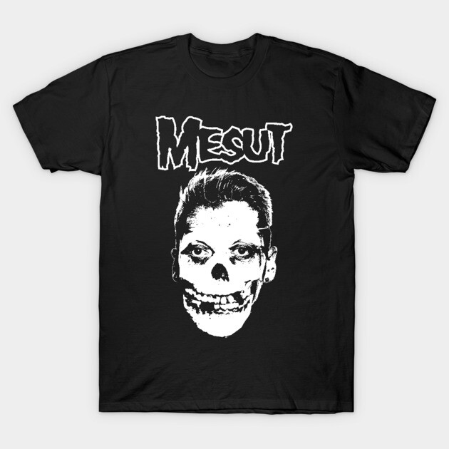 Black graphic t-shirt with skull design and bold white text, casual style, cotton material, perfect for everyday wear.