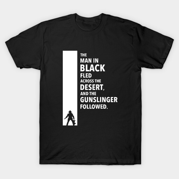 Black cotton t-shirt with bold white text about a desert pursuit, featuring a silhouette of a man. Casual and stylish.