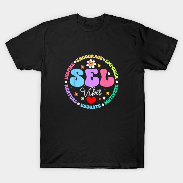 Black t-shirt with colorful "SEL Vibes" motivational print, featuring floral and heart accents, casual wear cotton fabric.